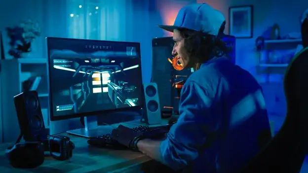 Man sitting in front of a computer