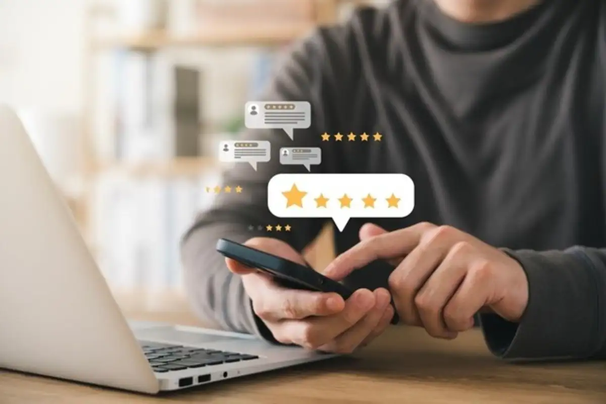 Man giving a review on his phone