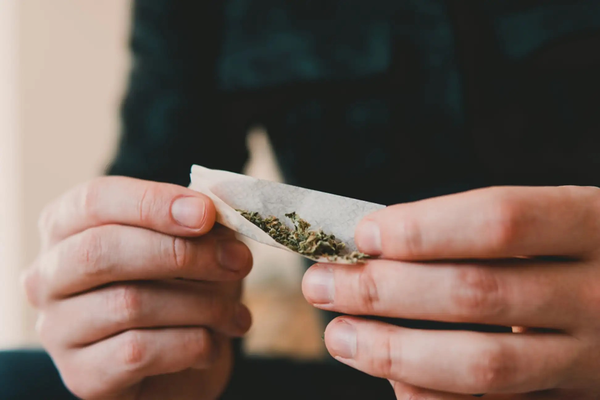 Man holding a cannabis product