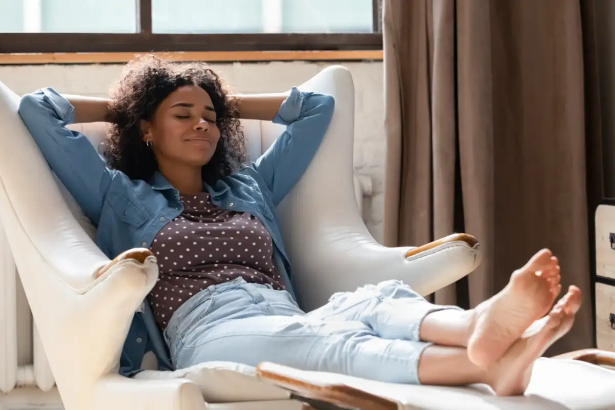 Woman relaxing on her couch