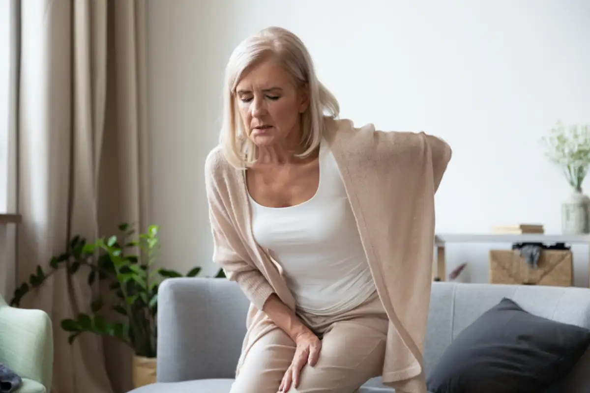 Woman suffer from backache discomfort
