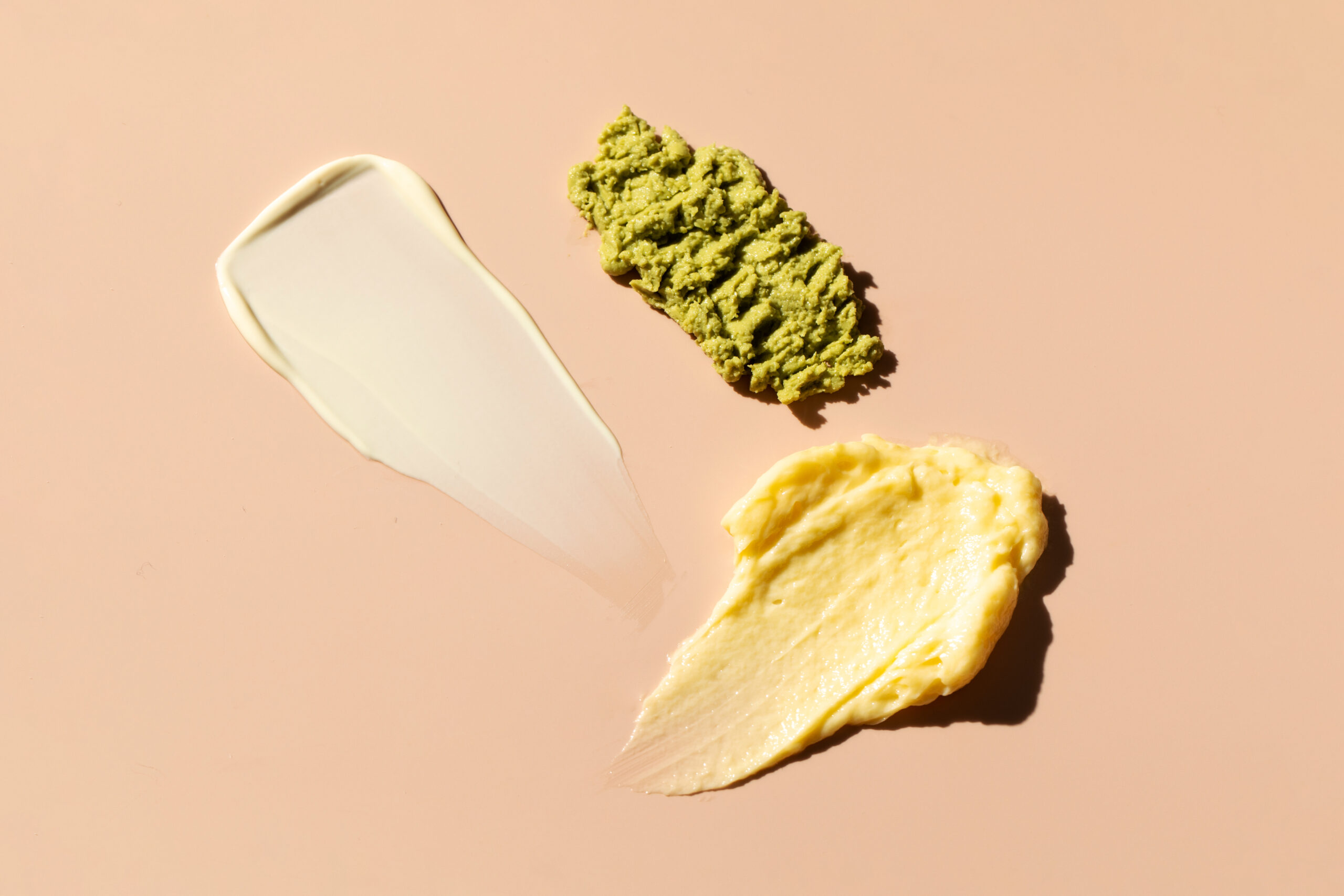 Samples and textures of various cosmetics for skin and hair care. Swatches.