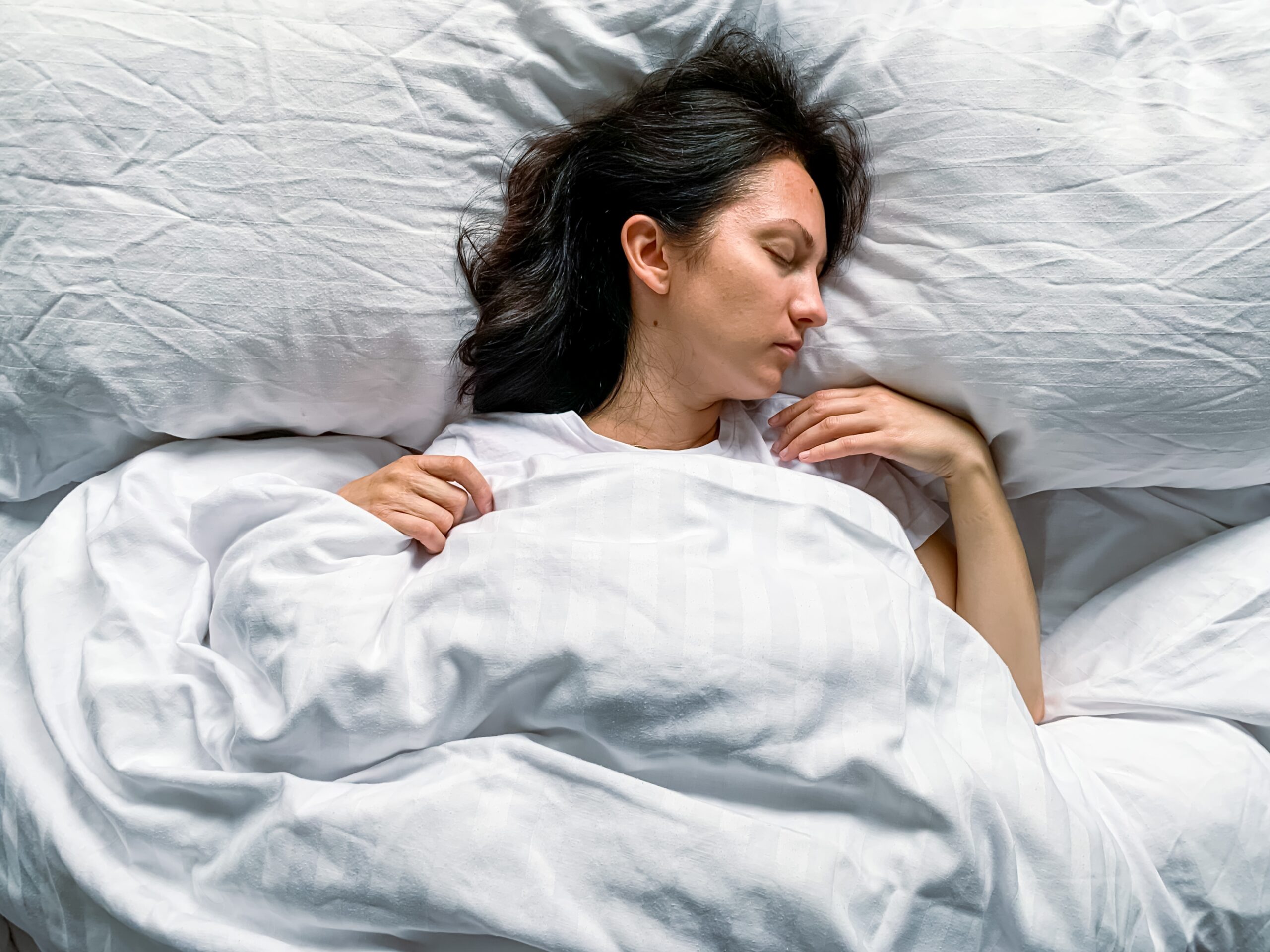 young millennial candid woman sleeps at home 